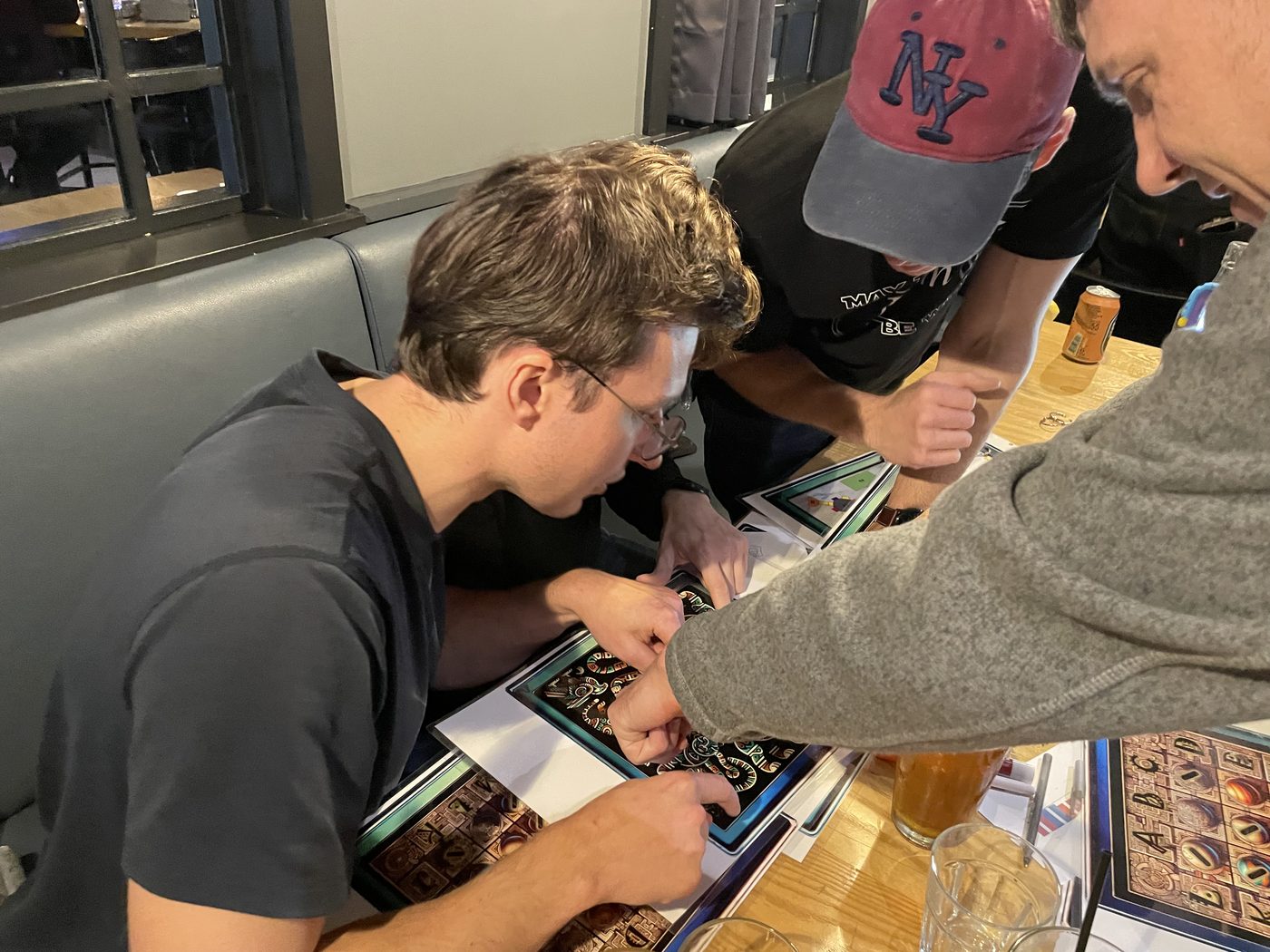 All hands on the puzzle.